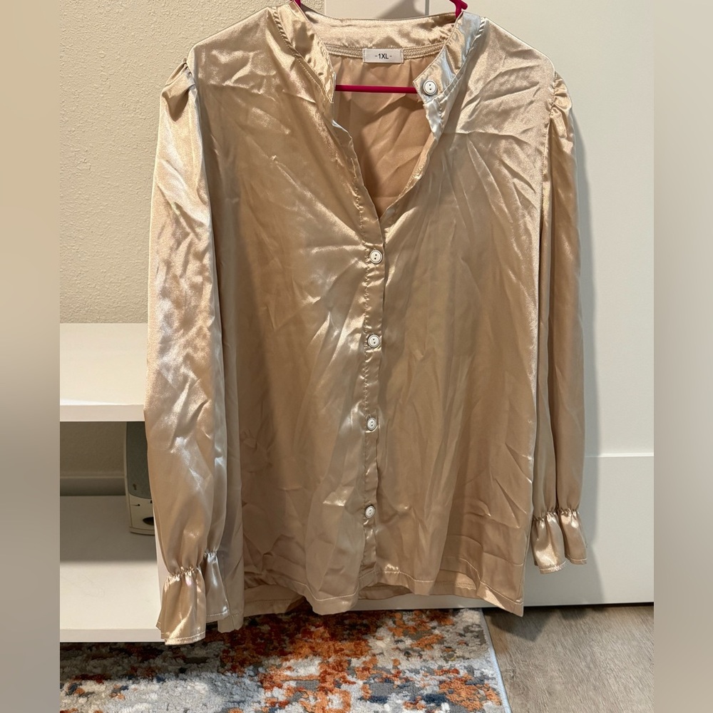 A golden satin shirt new worn brand new